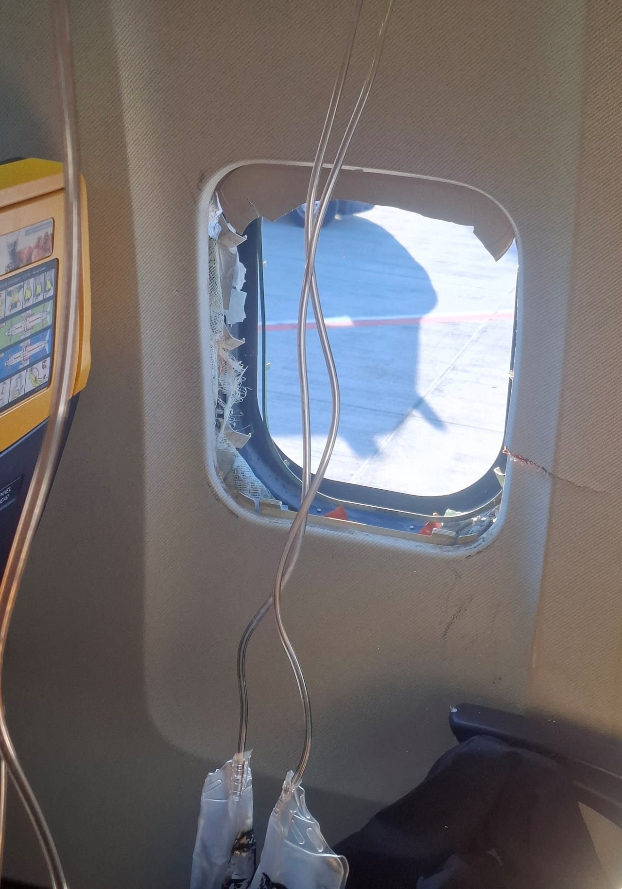 default-605 A broken window is seen on an aircraft.